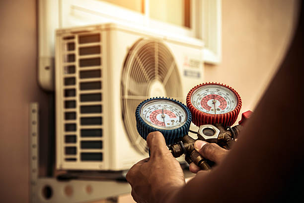 Professional Air Conditioning Service technician working in Palmdale, PA